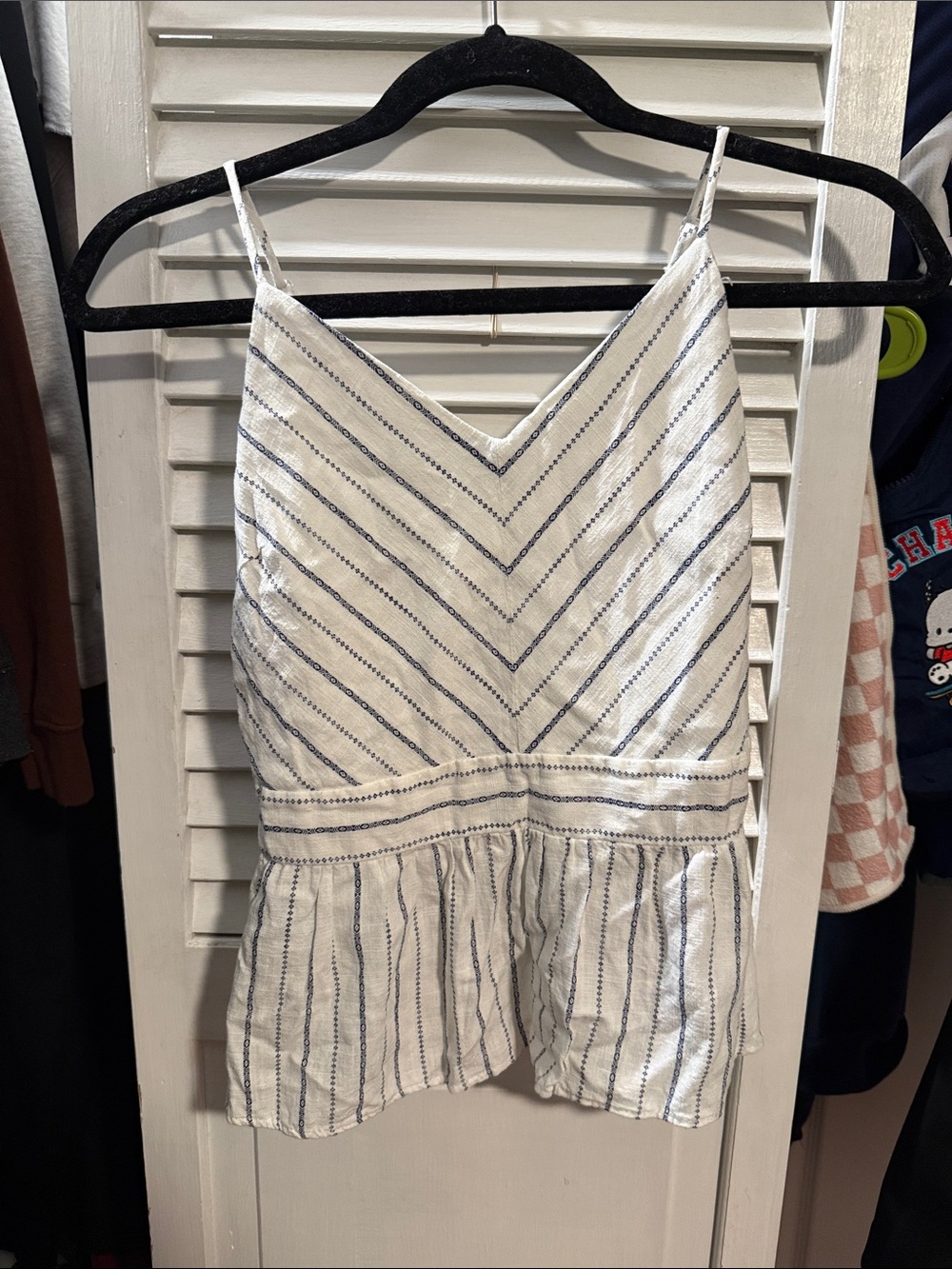 White patterned V-Neck Tank Top with Peplum Hem
